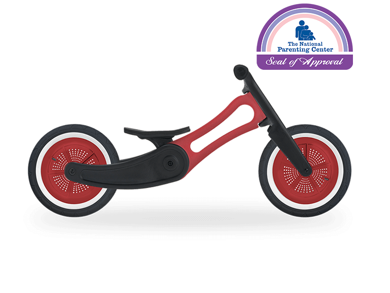 Red and black running bike with National Parenting Centre seal of approval
