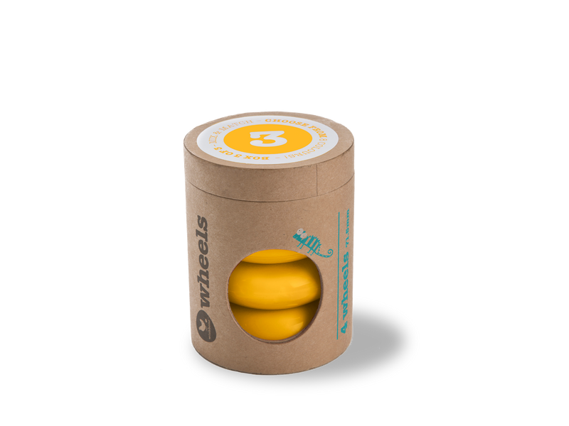 yellow wheels in cardboard tube